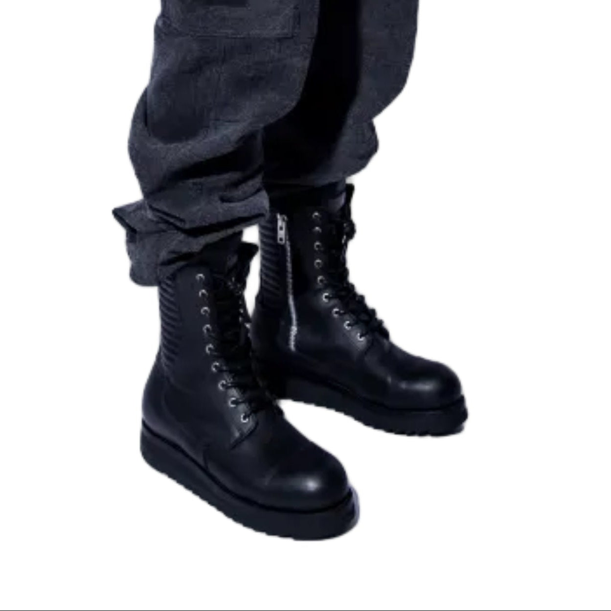 A man in a black jacket, dark cargo pants, and black boots, shown in profile against a solid white background.